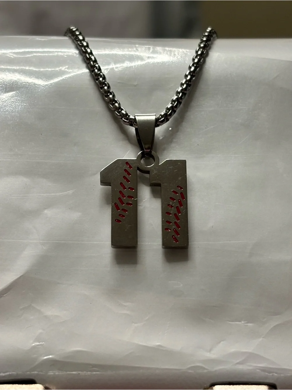 Sliver Number '11' Pendant Necklace with Baseball Red Stitch Detailing